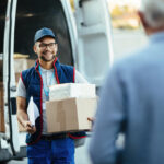 Courier delivering packages to a customer during a same-day delivery service