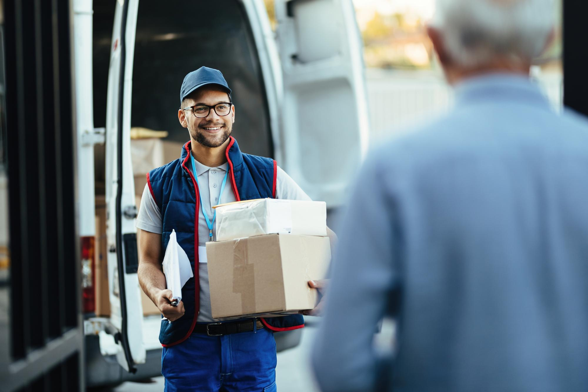 Courier delivering packages to a customer during a same-day delivery service